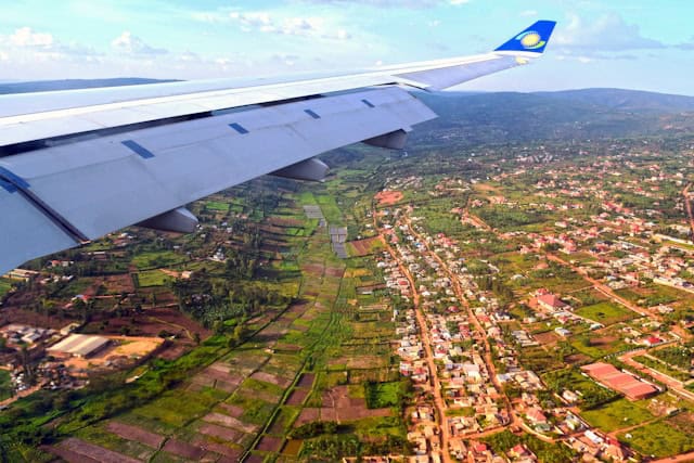 Looking out of a plane window on RwandaAir over Kigali