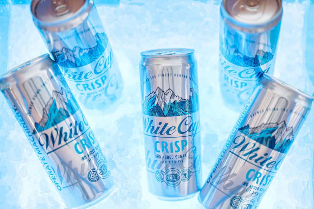 cans of White Cap Crisp on ice